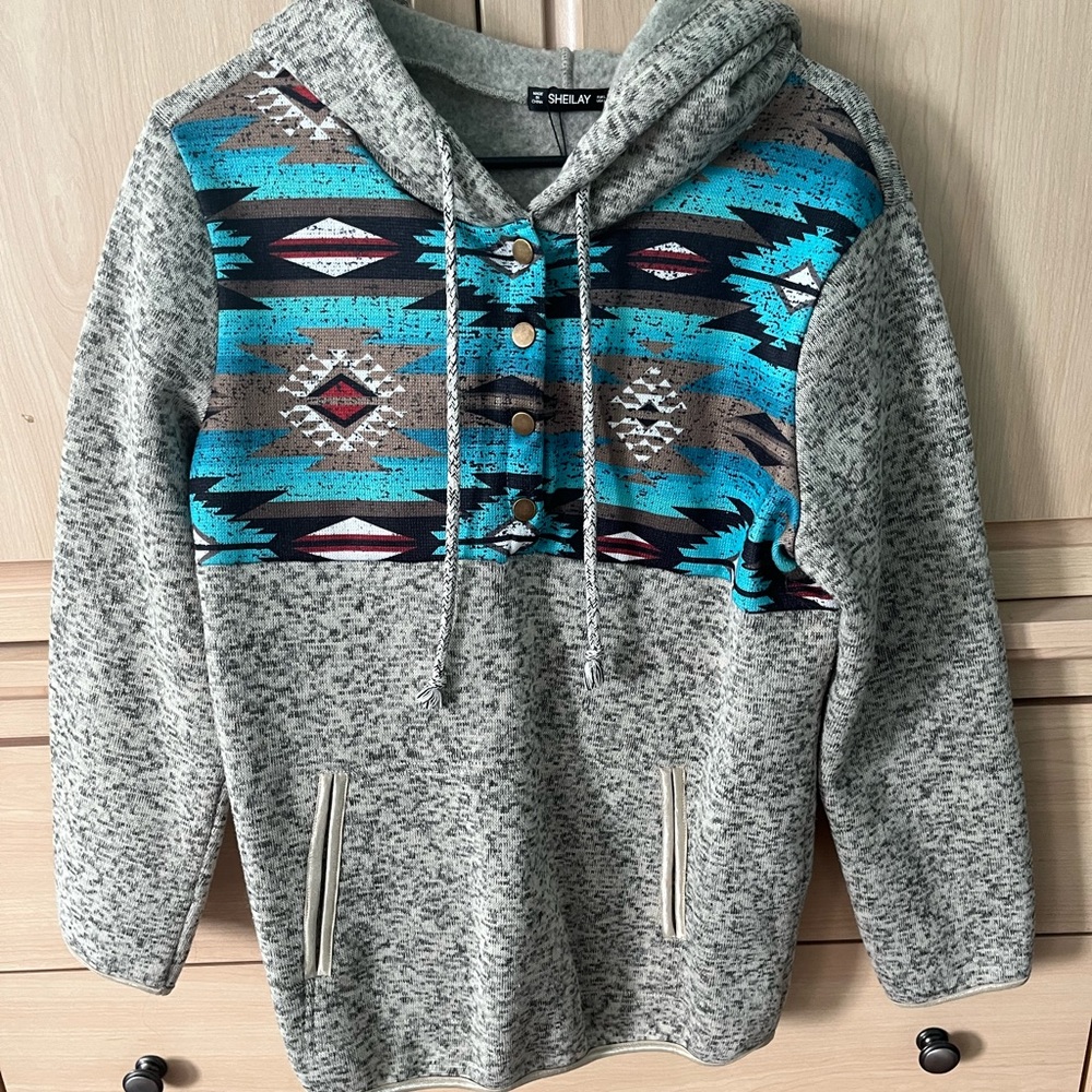 Aztec print sweater. Size: L